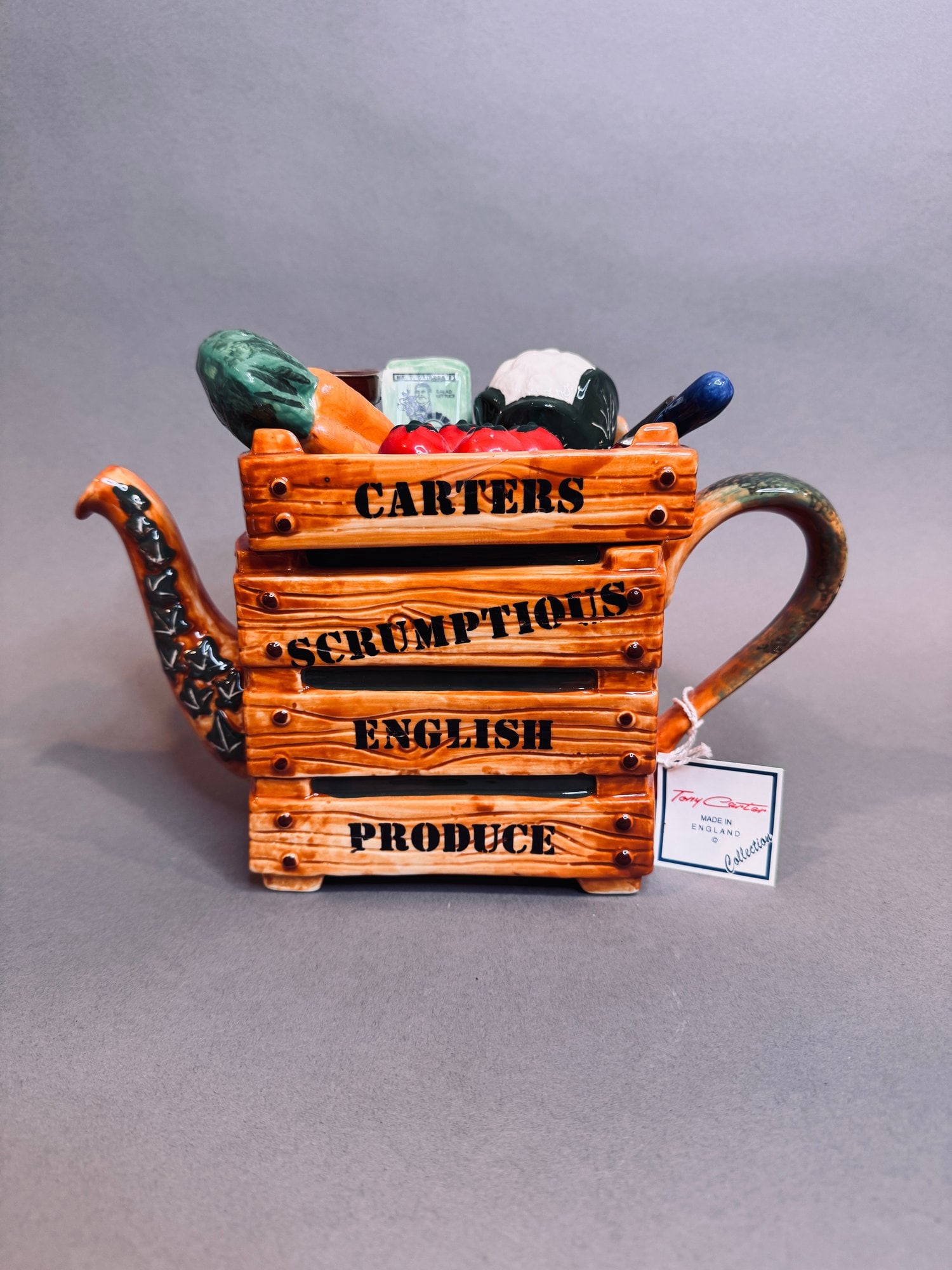 Tony Carter Carters Scrumptious English Produce Collectable Teapot: H: 9 3/4 inches x w: 11 1/2 inches x d: 5 inchesNo. 9609 (1996)Tagged and includes certificate of authenticity
