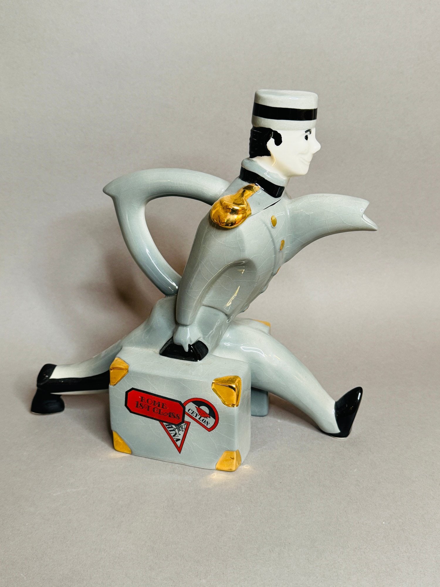 Swineside Grey Bellhop Collectable Teapot (Martin & Judy Bibby): H: 10 1/2 inches x w: 5 inches x d: 11 inches