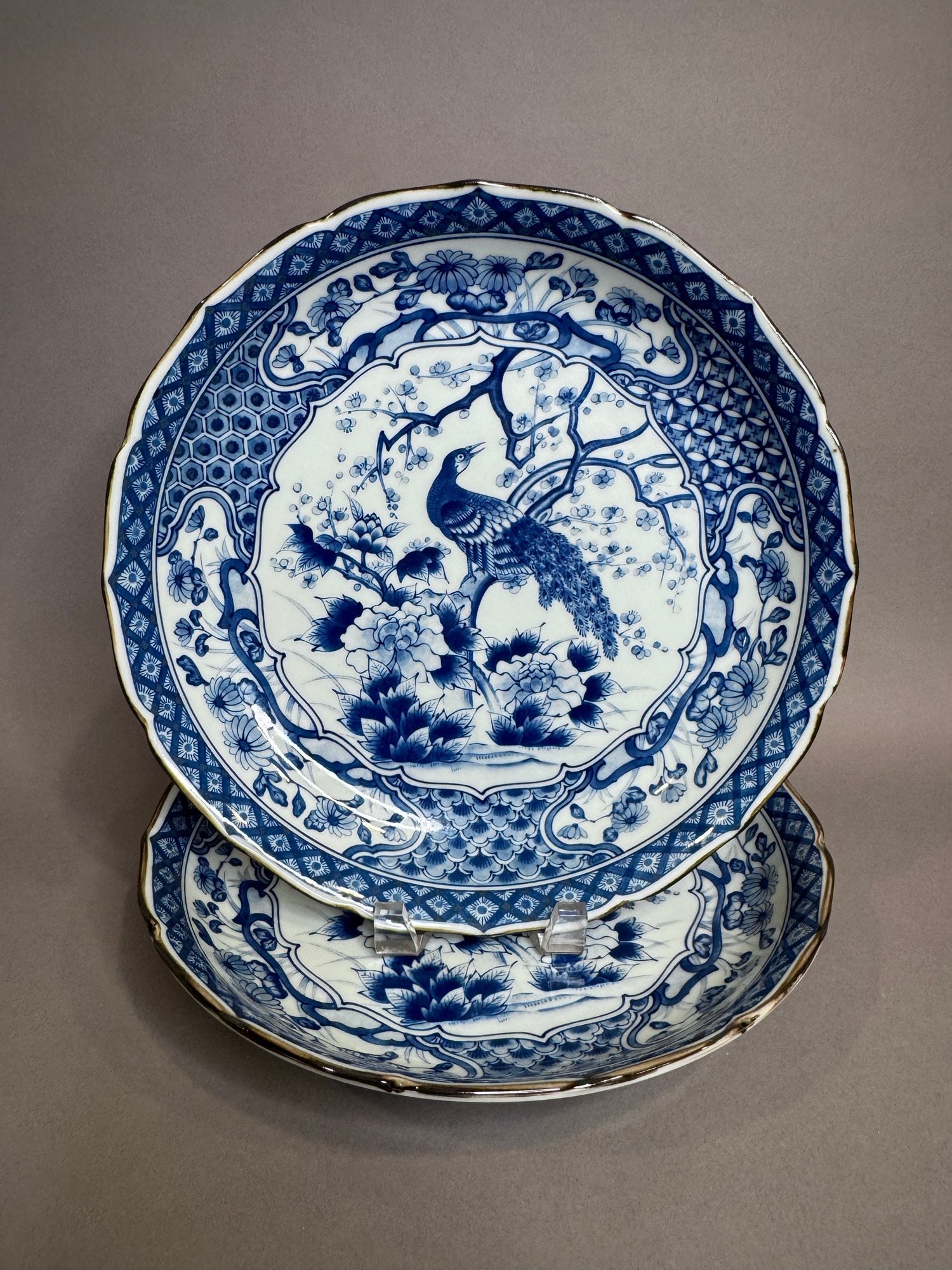 Pair Of Japanese Imari Blue And White Peacock Bowls (2): Factory marks to underside Dia.: 12 1/4 inches