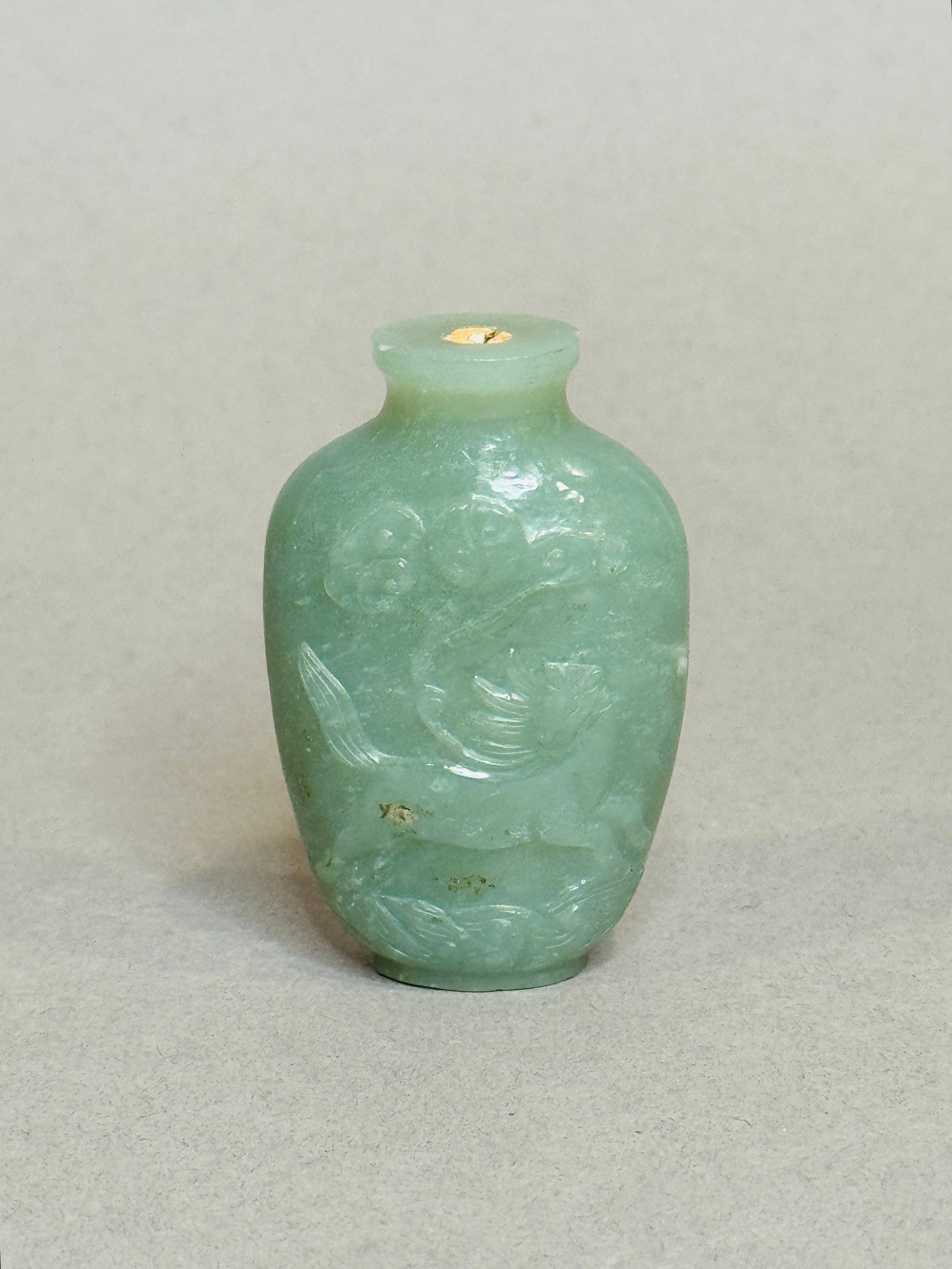 Chinese Carved Aventurine Quartz Snuff Bottle: H: 2 1/8 inches CONDITION: stopper is missing broken off cork and spoon remain in bottle