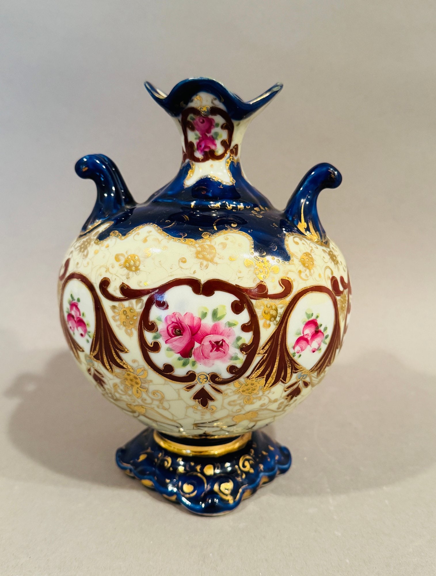 Nippon Cobalt And Polychrome Hand Painted Porcelain Footed Vase, C Late 19th-early 20th Century: Illegible backstamp under foot h: 7 3/4 x dia: 5 inches