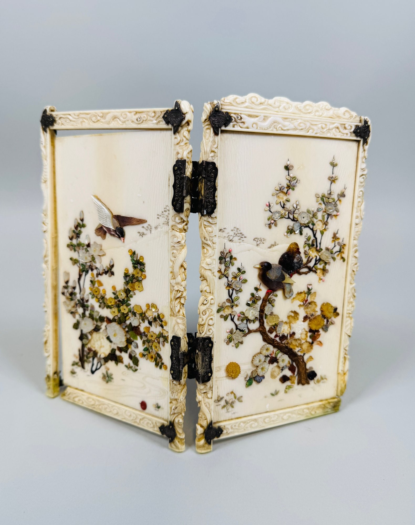 Japanese Two-Panel Table Screen, Meiji Period, Signed Shibayama: signed with oval red kakihan H: 7 1/8 x W: 8 inchesCONDITION: losses left side framed broken on one side and re-glued but still loose/fragile