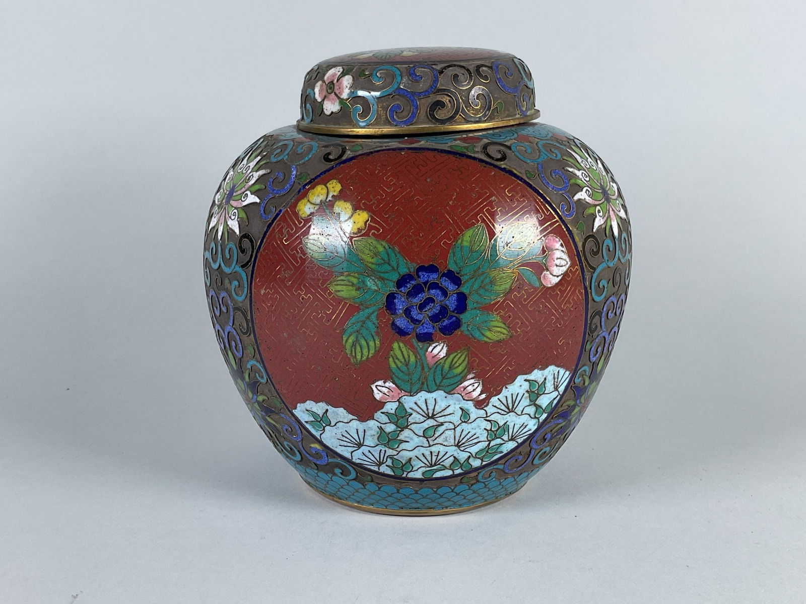 Chinese Cloisonne Enamel Ginger Jar And Cover, C. Early-Mid-20th Century: Unmarked h: 7 x dia: 6 inches CONDITION: slight dent at neck area scattered areas of discoloration to brass and enamel otherwise in good condition