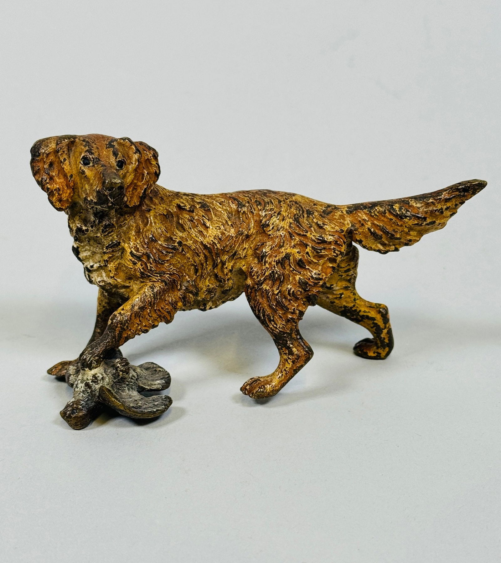 Painted Cast Iron Retriever With Bird Paper Weight: Decorative desk ornamentH: 3 inches x w 4 1/2 inches