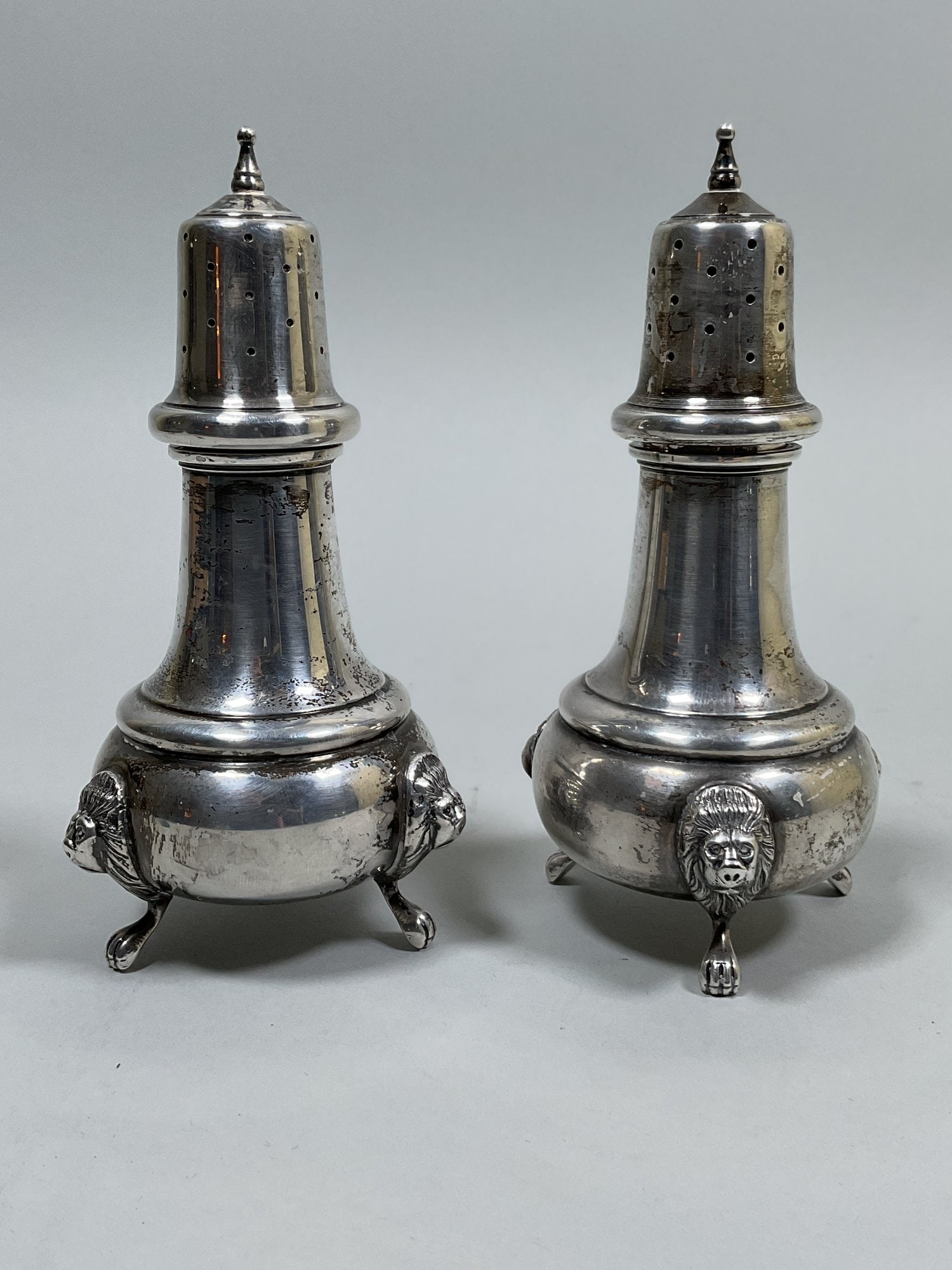 Vintage Sterling Silver Salt And Pepper Shakers: Stamped underneath sterling h: 5 x dia: 3 1/2 inches OZT: 5.74
