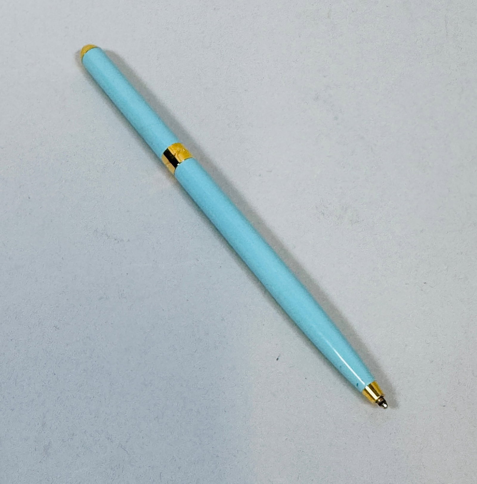 Tiffany & Co. Blue Enamel And Gold Tone Ballpoint Purse Pen: Stamped Tiffany & Co./Germany h: 4 1/2 inches