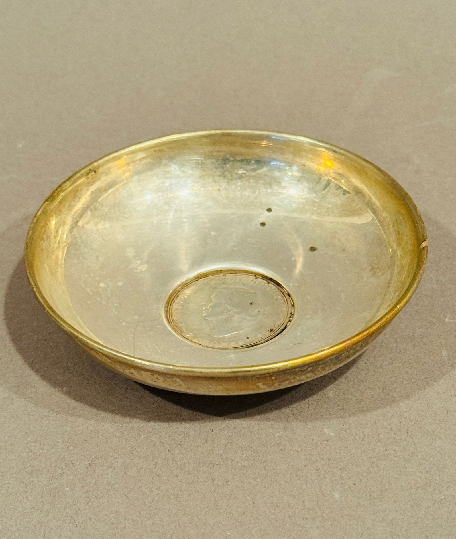 A Baldwin & Miller (Denmark) Sterling Silver Kroner Dish With A Princess Margrethe Head , 1958: Stamped B&M/Sterling/761 dia: 3 5/8 inches OZT: 2.18