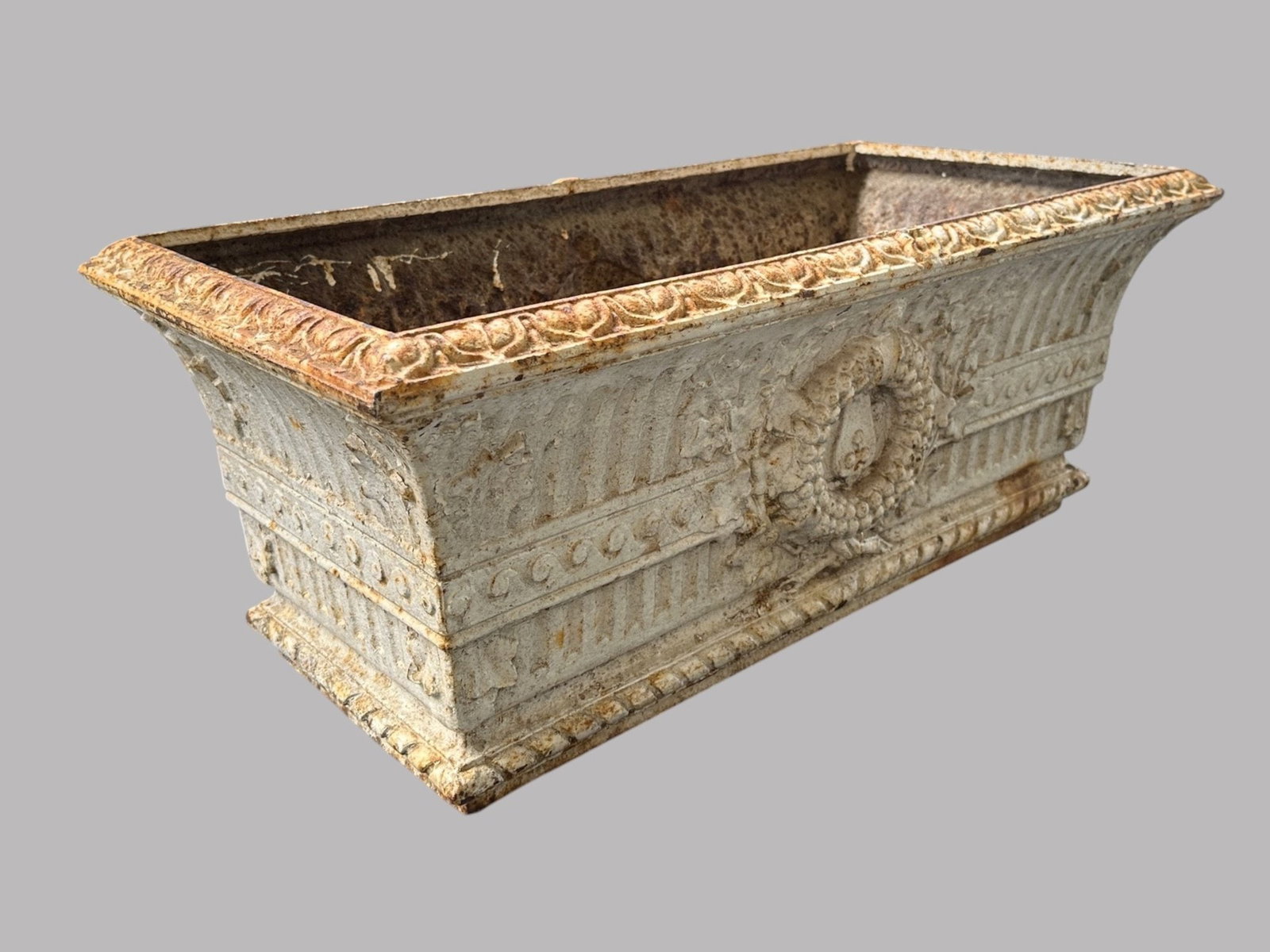 Neoclassical Style White Painted Cast Iron Garden Planter With Wreath Relief: H: 11 1/4 x W: 28 1/8 x D: 14 inchesCONDITION: rust wear to paint
