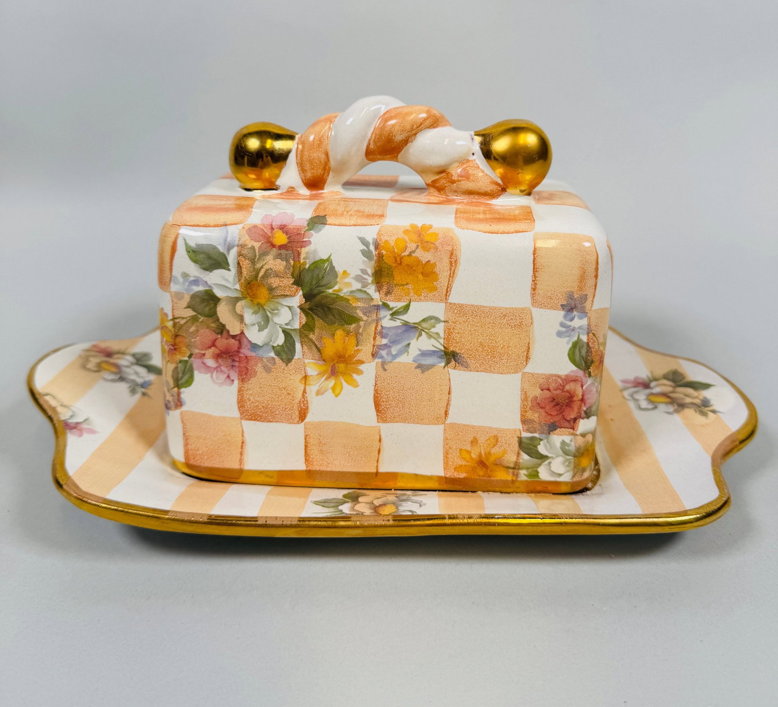 Mackenzie Childs Stoneware Honeymoon Morning Glory Pattern Covered Butter Dish, 1995: Stamped and dated underneath h: 5 1/2 x w: 10 x d: 6 inches CONDITION: scattered minor glaze losses free of chips no repairs