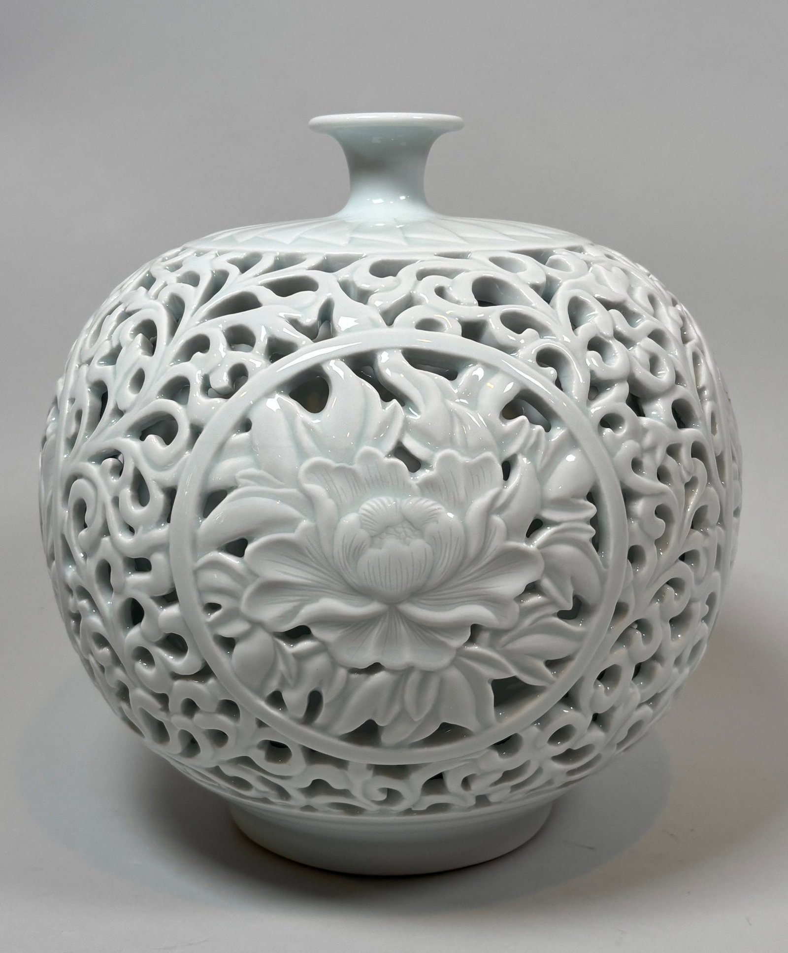 Korean White Glazed Openwork Vase With Peony And Other Flowers, 20th Century: Jeon Seon Keun signed Seolbongh retains retail sticker under foot and underglaze marks : 9 1/2 inches x dia: 9 inches