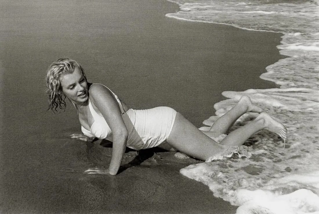 SAM SHAW - Marilyn Monroe, Amagansett, NY, 1957: Marilyn Monroe, Amagansett, NYPhoto-litho, circa late 20th c.Dimensions: 8.6 x 5.75 inchesWork is mounted