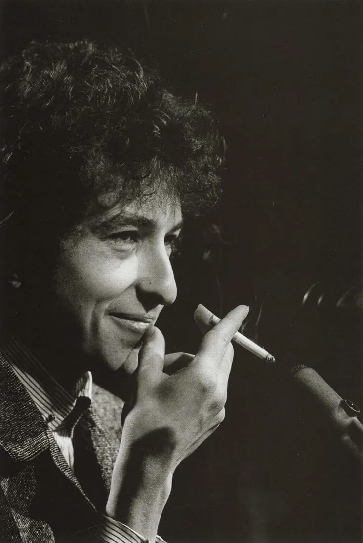 JIM MARSHALL - Bob Dylan Smiling, 1965: Bob Dylan, Smiling, 1965Photo-litho, c. 2000Dimensions: 4.8 x 7.25 inchesWork is mounted