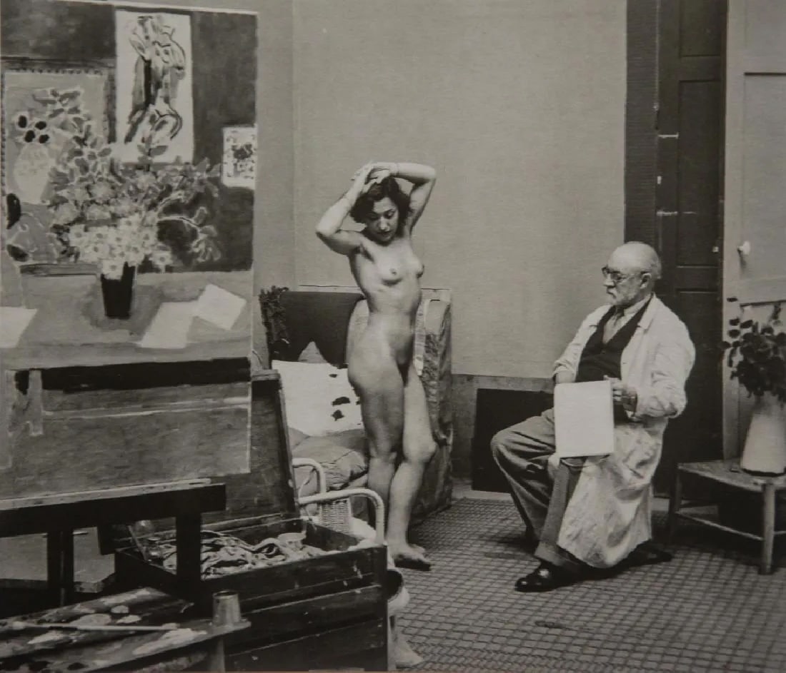 BRASSAI - Matisse with his model, 1939: Matisse with his model, 1939Photo-litho, late 20th c. Dimensions: 8 x 6.25 inchesWork is mounted
