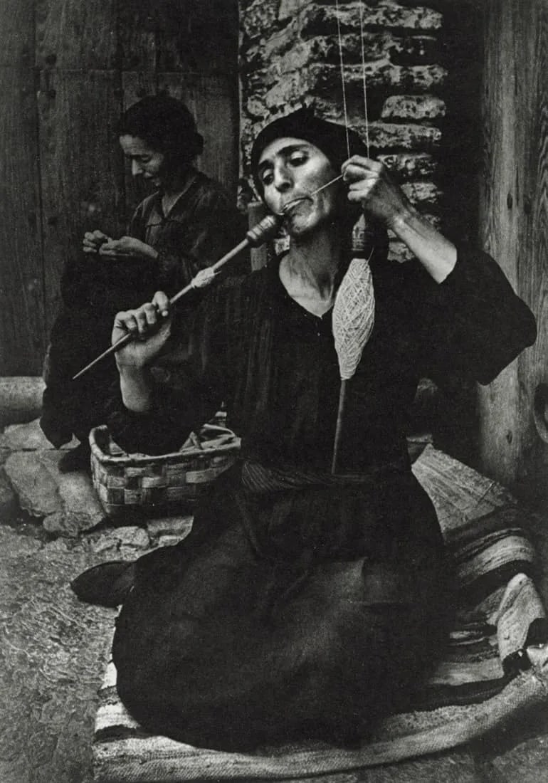 W. EUGENE SMITH - A Woman Spinning, Spain, 1951: A Woman Spinning, Spain, 1951Photo-litho, c. 1980'sDimensions: 5.6 x 8 inchesWork is mounted