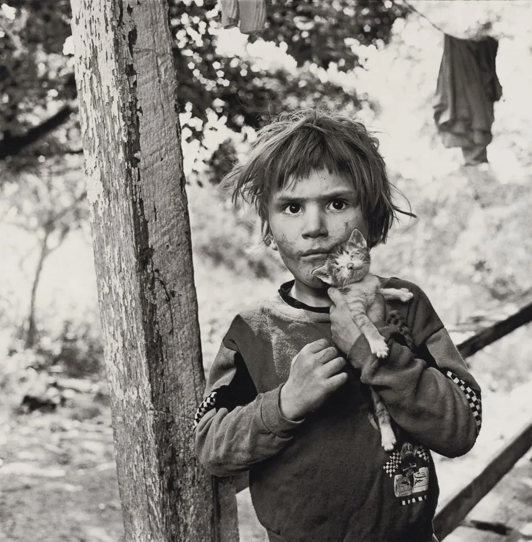Mary Ellen Mark - Christopher Sandgap, Kentucky: Christopher Sandgap, Kentucky, 1990Photo-litho, c. 1990'sDimensions: 6.9 x 7 inchesWork is mounted