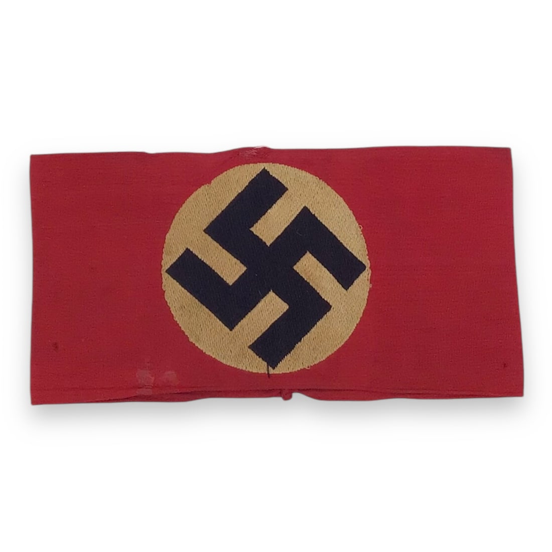 German WW2 SA/NSDAP Red Armband with Swastika High Quality Embroidered White Background: This is an original WWII-era German SA/NSDAP Red Armband featuring a high-quality embroidered swastika on a white background. These armbands were worn by members of the Nazi Party (NSDAP) and its para