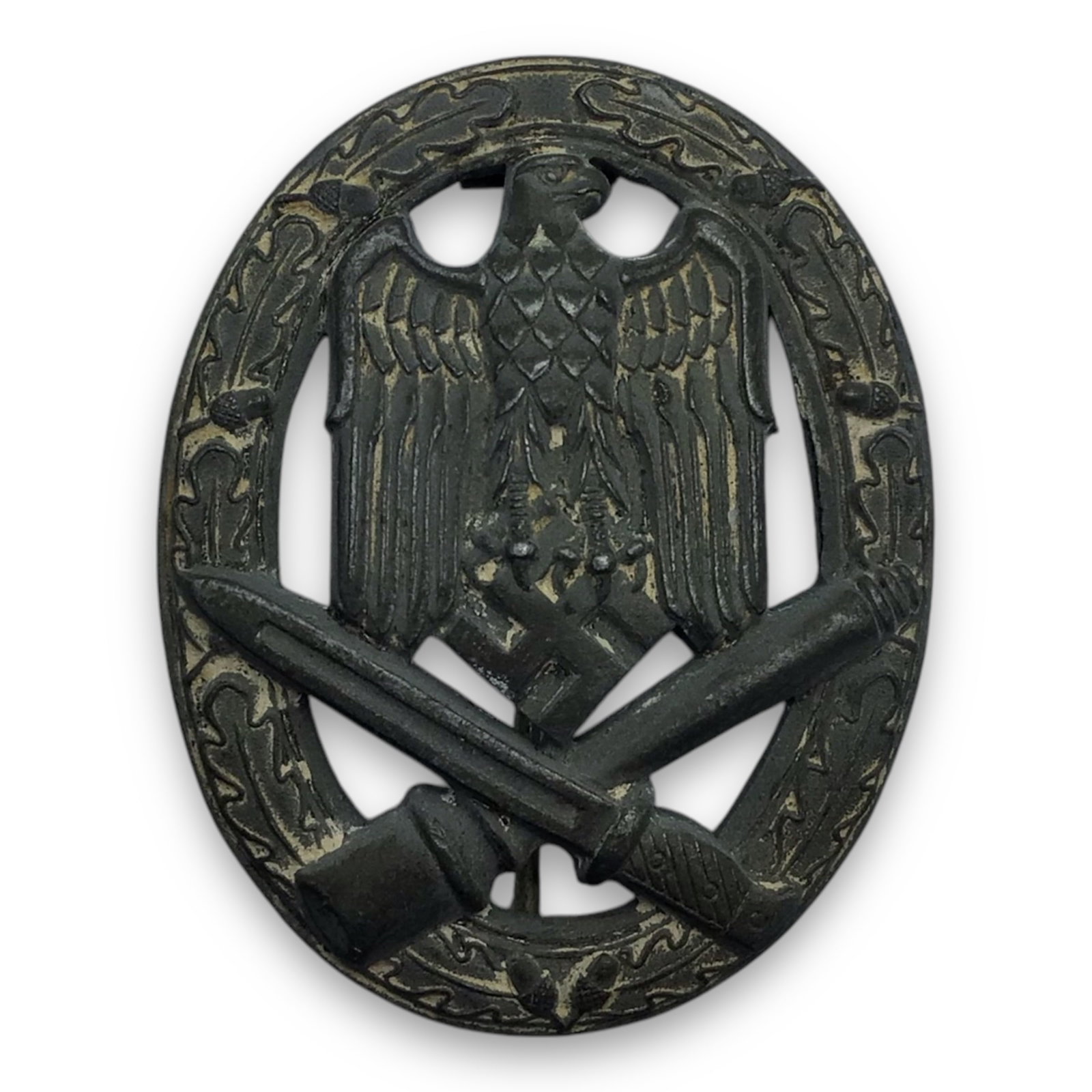 German WW2 General Assault Badge - Marked "G.B.42" Gustav Brehmer, Markneukirchen: This WW2 German General Assault Badge is marked "G.B.42" for Gustav Brehmer, Markneukirchen. Manufactured in 1942, this mid-war variant is a solid zinc construction with a curved profile and a flat-ba