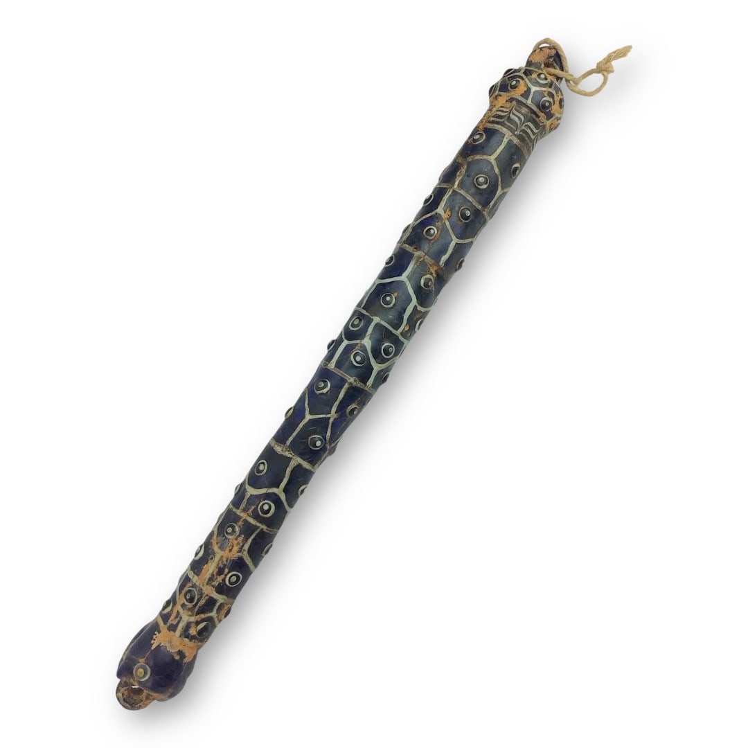 Ancient Phoenician Glass Staff, Ruler Rod, or Scroll Holder (circa 2nd–1st Millennium B.C.): This exceptionally rare and museum-quality Phoenician glass artifact likely functioned as either a ceremonial staff head, a ruler’s scepter rod, or an ornate scroll holder. Dating from the 2nd to 1s
