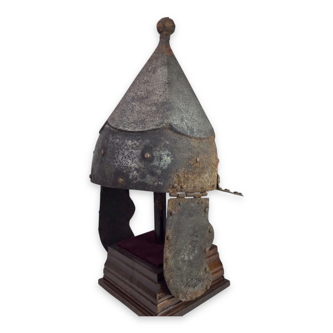 Rare Early Islamic Steel Helmet with Kufic Inscriptions – Possibly Early Ottoman: An exceptionally rare and visually striking Islamic steel helmet, likely dating to the early Ottoman period or similar Islamic dynastic era. Crafted in a multi-piece construction with sloped, faceted 