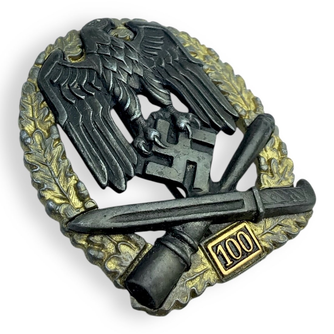 German WW2 Incredibly Rare General Assault Badge - "100 Engagements" Variant: Offered here is a premier example of the exceedingly rare 100 Engagement General Assault Badge (Allgemeines Sturmabzeichen mit Einsatzzahl 100). The front retains nearly all of the dark burnished fini