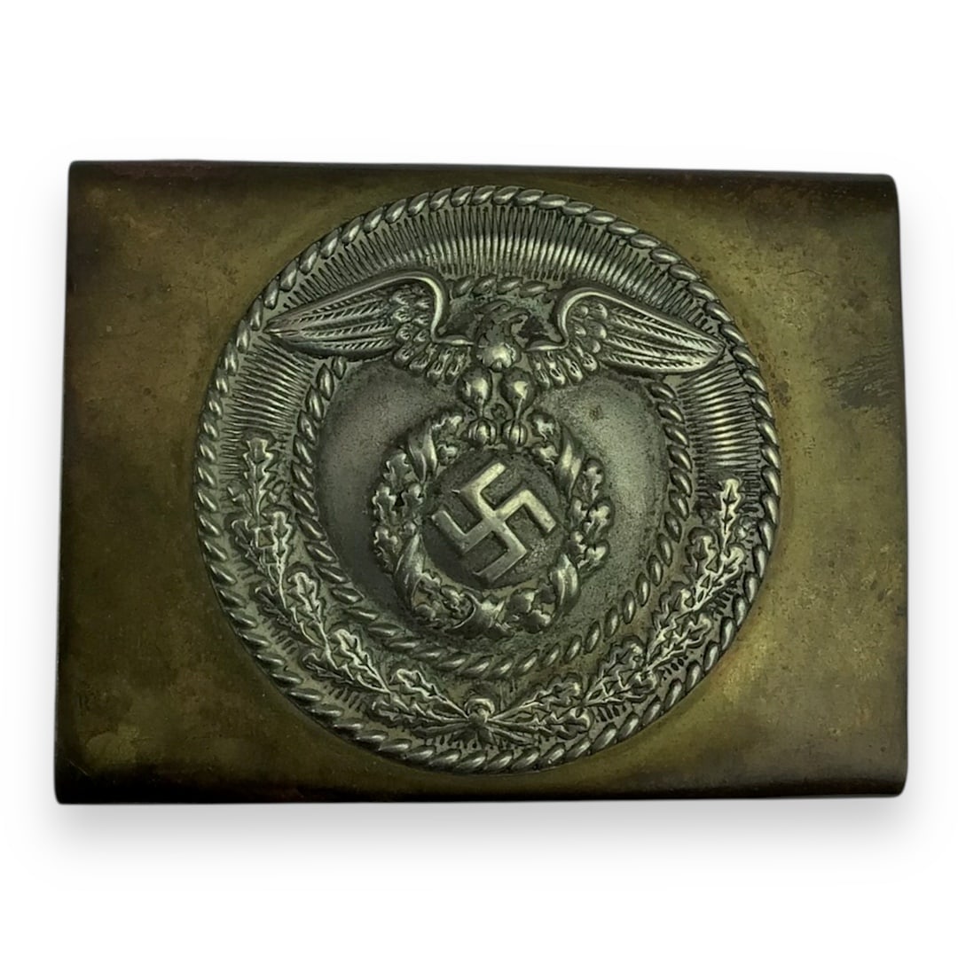 German WW2 Sturmabteilung (SA) Belt Buckle: This is a WWII-era belt buckle issued to members of the German SA (Sturmabteilung), the paramilitary wing of the Nazi Party during the 1930s and early wartime period. Constructed from brass, this exam
