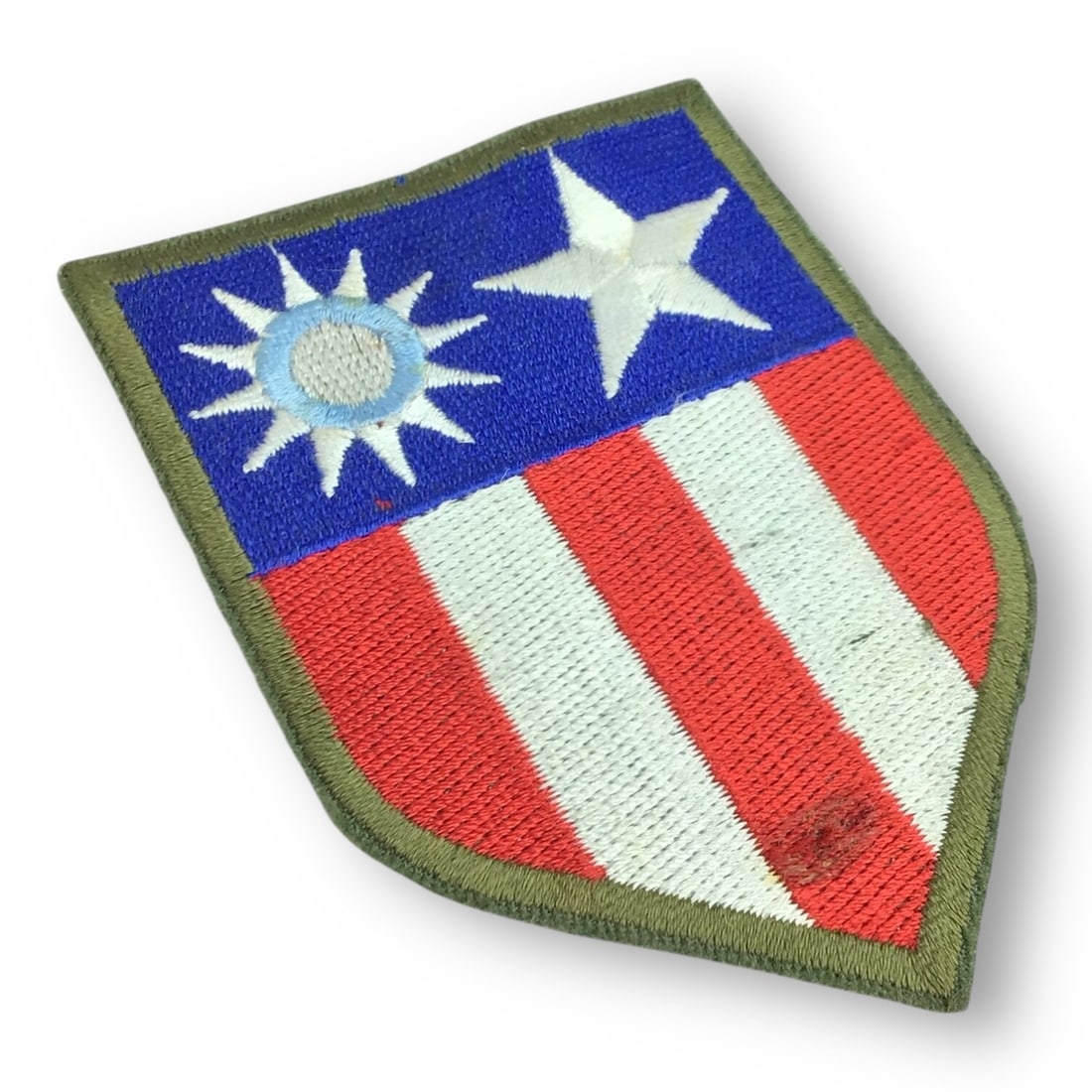 U.S. Army China-Burma-India (CBI) Theater Patch – Original: This is an original World War 2 United States Army China-Burma-India (CBI) Theater patch, issued to personnel serving in one of the most logistically complex and geographically challenging campaigns
