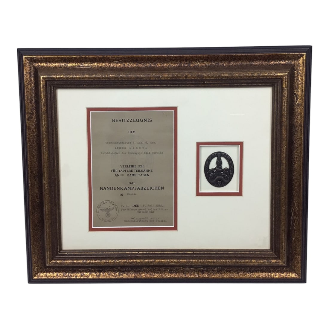Bandit Warfare Badge in Bronze for Ukraine Service with Award Documentation Framed and Matted: Bandit-warfare Badge (Bandenkampfabzeichen), also called Anti-Partisan or Guerrilla Warfare Badge, was a World War II decoration of Nazi Germany awarded to members of the Army, Luftwaffe, Order Police