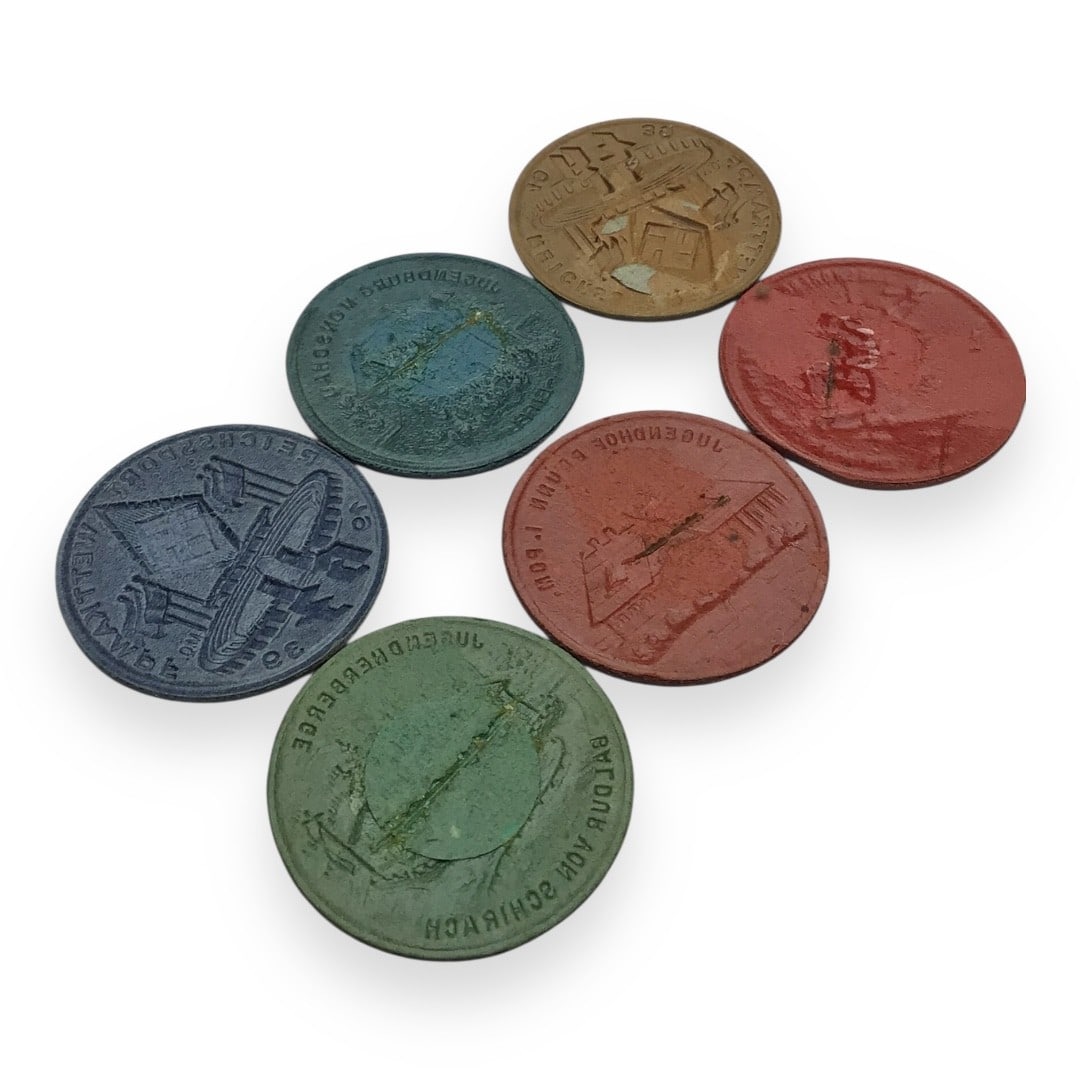 Collection of German WW2 Hitler Youth Hostel Commemoration Badges: This original set of six German WW2 Hitler Youth (Hitlerjugend) commemorative hostel badges offers a fascinating glimpse into the cultural infrastructure of the Third Reich’s youth movement