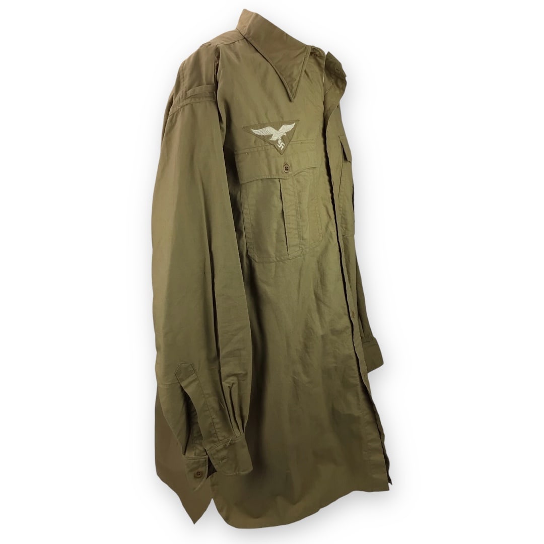 German WW2 Luftwaffe Tropical ‘Afrikakorps’ Field Shirt – Pilot/Paratrooper Named & 1941-Dated: This is a tropical Luftwaffe field shirt from 1941, designed for use in hot climates such as North Africa or Southern Europe. Constructed in tan cotton twill, it is clearly marked in the collar, inclu
