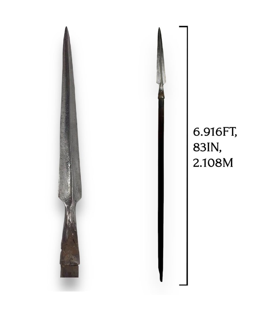 European Renaissance Large Triangular Head Spear Circa 1490 A.D.: This European Gothic spear, dating from 1500-1700, retains its original wooden shaft and metal "lizard sticker" end cap. The massive spearhead features an equally as strong medial ridge, reinforcing i