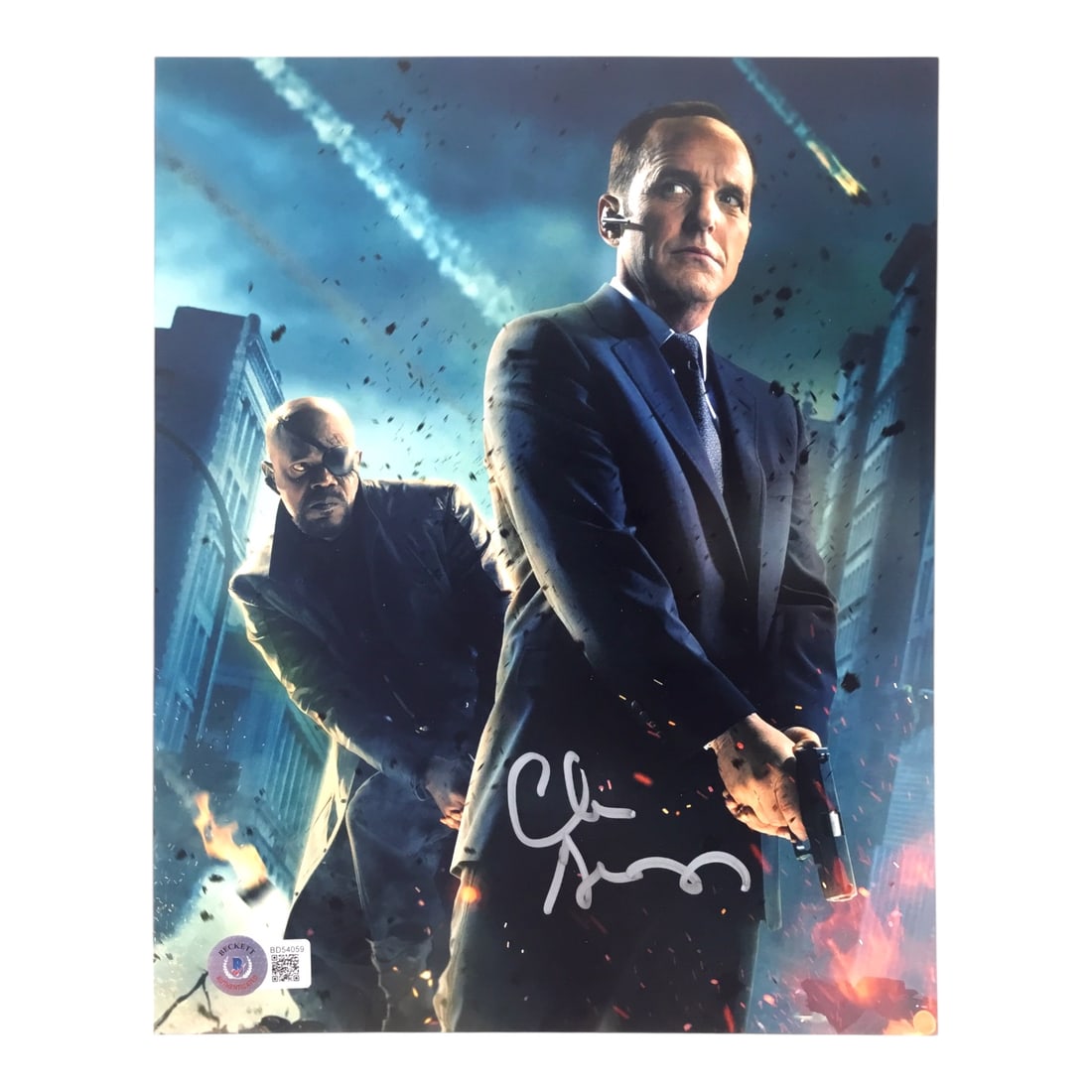 Clark Gregg Signed 8x10 Avengers Photo (Beckett Certified): Presented here is an autographed 8x10 photo of Clark Gregg as Agent Phil Coulson, the loyal S.H.I.E.L.D. operative and fan-favorite character from The Avengers and across the Marvel franchise. The sig