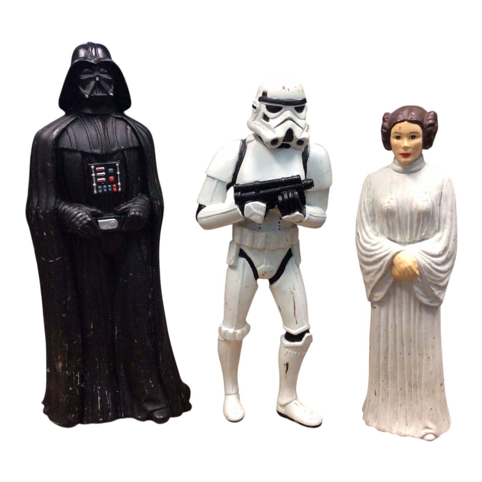 Vintage Star Wars Vinyl Figures: Darth Vader, Stormtrooper, Leia Produced by Out of Character: This nostalgic trio of vintage vinyl Star Wars figures features three of the franchise's most iconic characters: Darth Vader (10.5" tall), Princess Leia (9"), and a Stormtrooper (9.5"). Produced by Ou