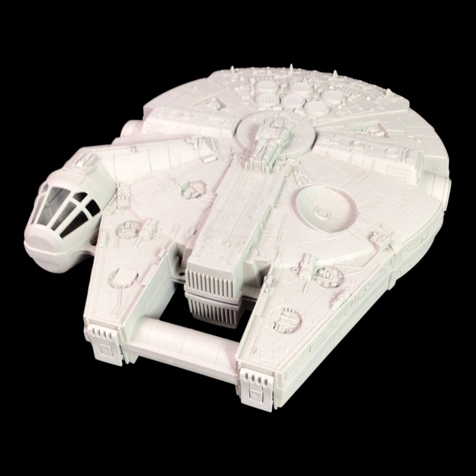Vintage Star Wars Millennium Falcon Action Figure Carry Case from 1997: A beloved classic from the late 1990s, this vintage Star Wars action figure carry case is molded in the shape of the Millennium Falcon and dates to 1997. Originally produced as part of the franchise's