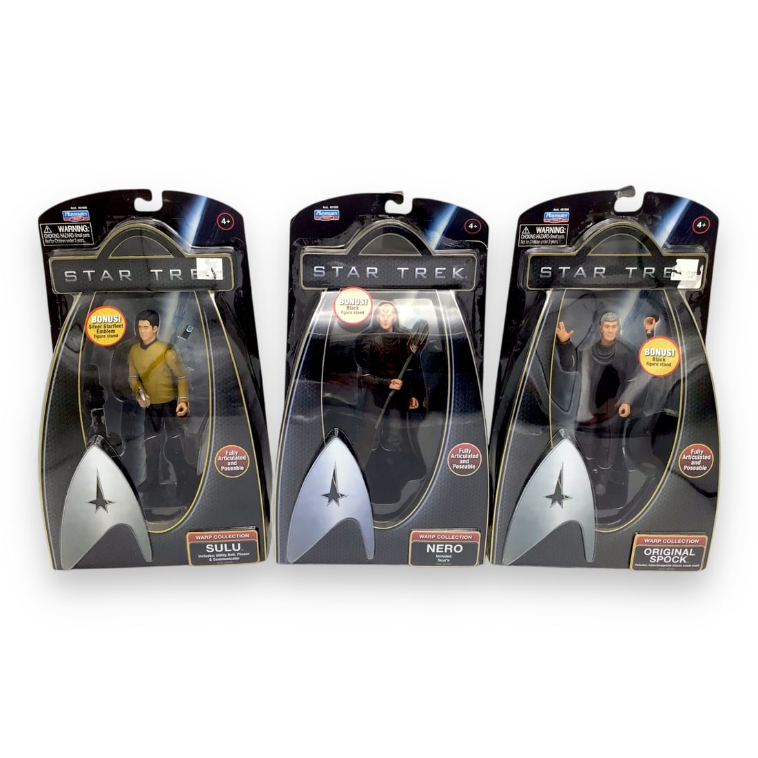 Star Trek Warp Collection Action Figures - Set of 3: A trio of figures from the Star Trek Warp Collection by Playmates Toys, each sealed in original packaging. Includes Sulu in his Starfleet uniform, the Romulan villain Nero, and a nostalgic appearance
