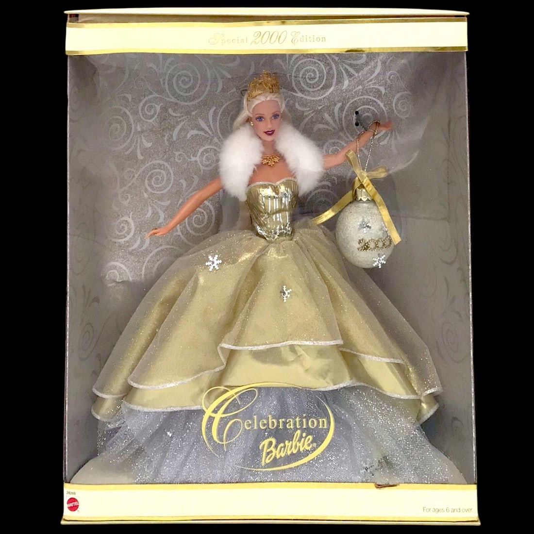 Vintage 2000 Mattel Holiday Celebration Barbie Special Edition Collector Doll - NIB: Celebrate the turn of the millennium with this 2000 Holiday Celebration Barbie, part of Mattel's cherished Special Edition line. Barbie shines in a shimmering silver-and-white gown with flowing blonde