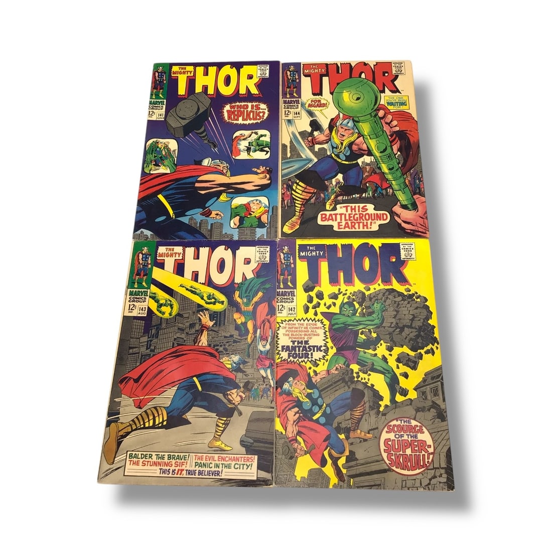 The Mighty Thor Vintage Marvel Raw Comic Collection (#141-144): A powerful four-issue selection of The Mighty Thor from Marvel's Silver/Bronze Age transition. Includes Issues #41 (June), #42 (July), #143 (Aug), and #144 (Sept). These comics showcase the thunder go