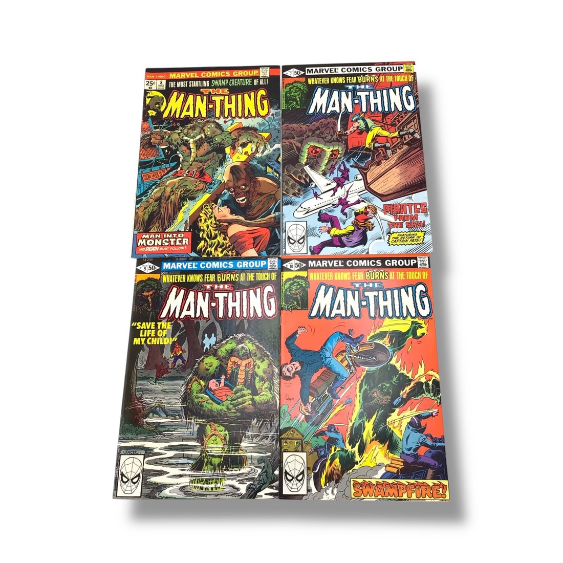 Marvel Comics "The Man-Thing" Raw Comic Book Lot of 4: Dive into the murky depths of Bronze Age horror with this bundled lot of The Man-Thing comics from Marvel Comics Group. Featuring issues #7, #8, #9, and #10, this mid-run stretch showcases the eerie a