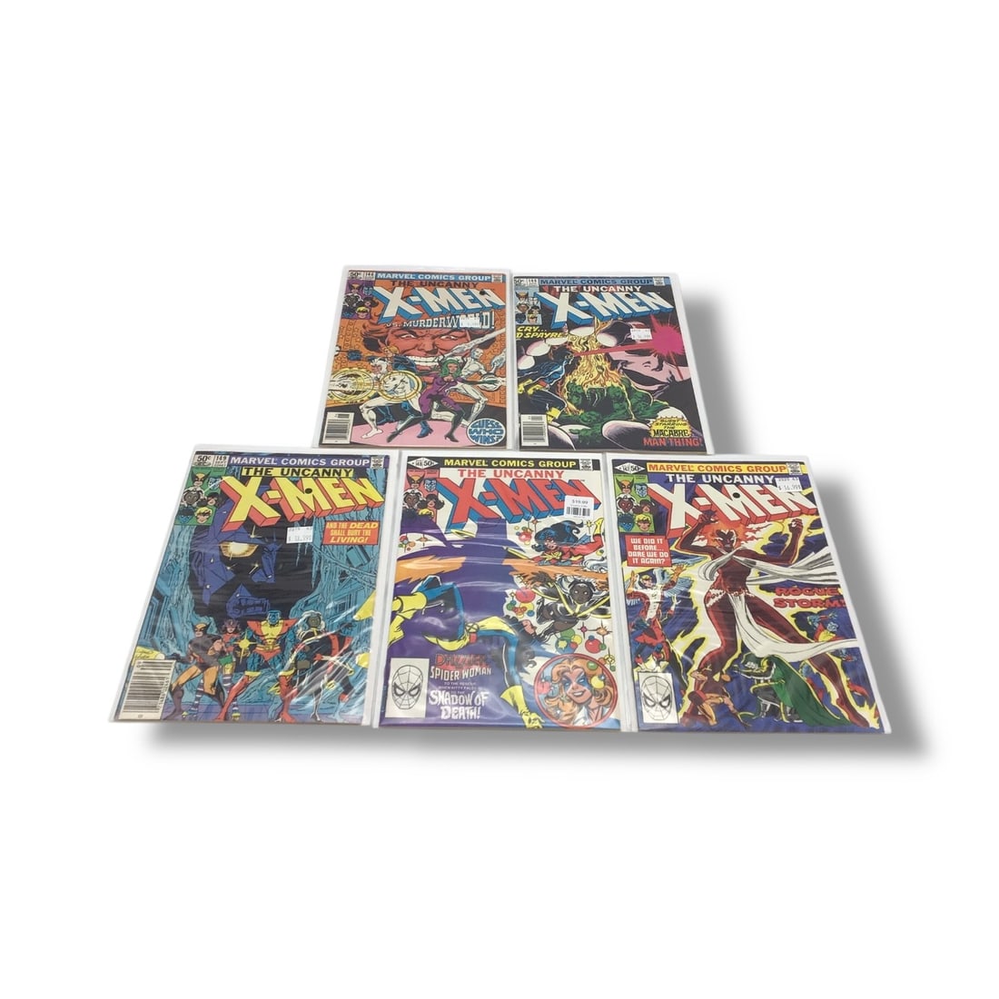Uncanny X-Men Lot of 5 Raw Comics #144, 146, 147, 148, 149: This five-issue Bronze Age bundle of Uncanny X-Men includes #144, #146, #147, #148, and #149, capturing the team's early '80s momentum with striking covers and compelling mutant-driven narratives. Key