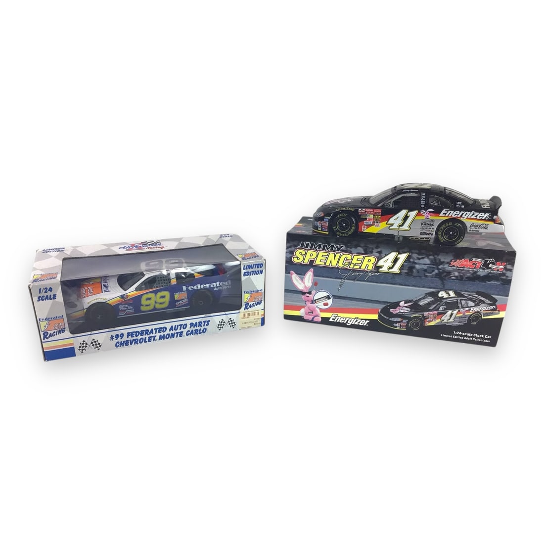 Two 1:24 Scale Stock Cars - #99 Federated Auto Parts & #41 Jimmy Spencer: Featuring two standout 1:24 scale NASCAR die-cast models, this lot offers the #99 Federated Auto Parts Monte Carlo and the limited-edition black #41 Energizer Chevrolet driven by Jimmy Spencer. Both c