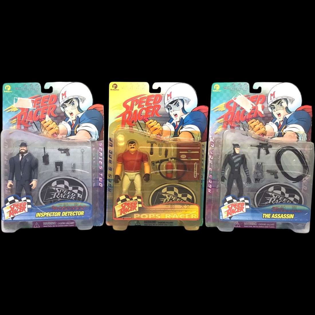 Speed Racer Series 2 Action Figures by ReSaurus - Set of 3: This trio of vintage Speed Racer action figures from Series Two includes Inspector Detector, Pops Racer, and The Assassin, each sealed in original ReSaurus packaging. With bold colors, expressive scul