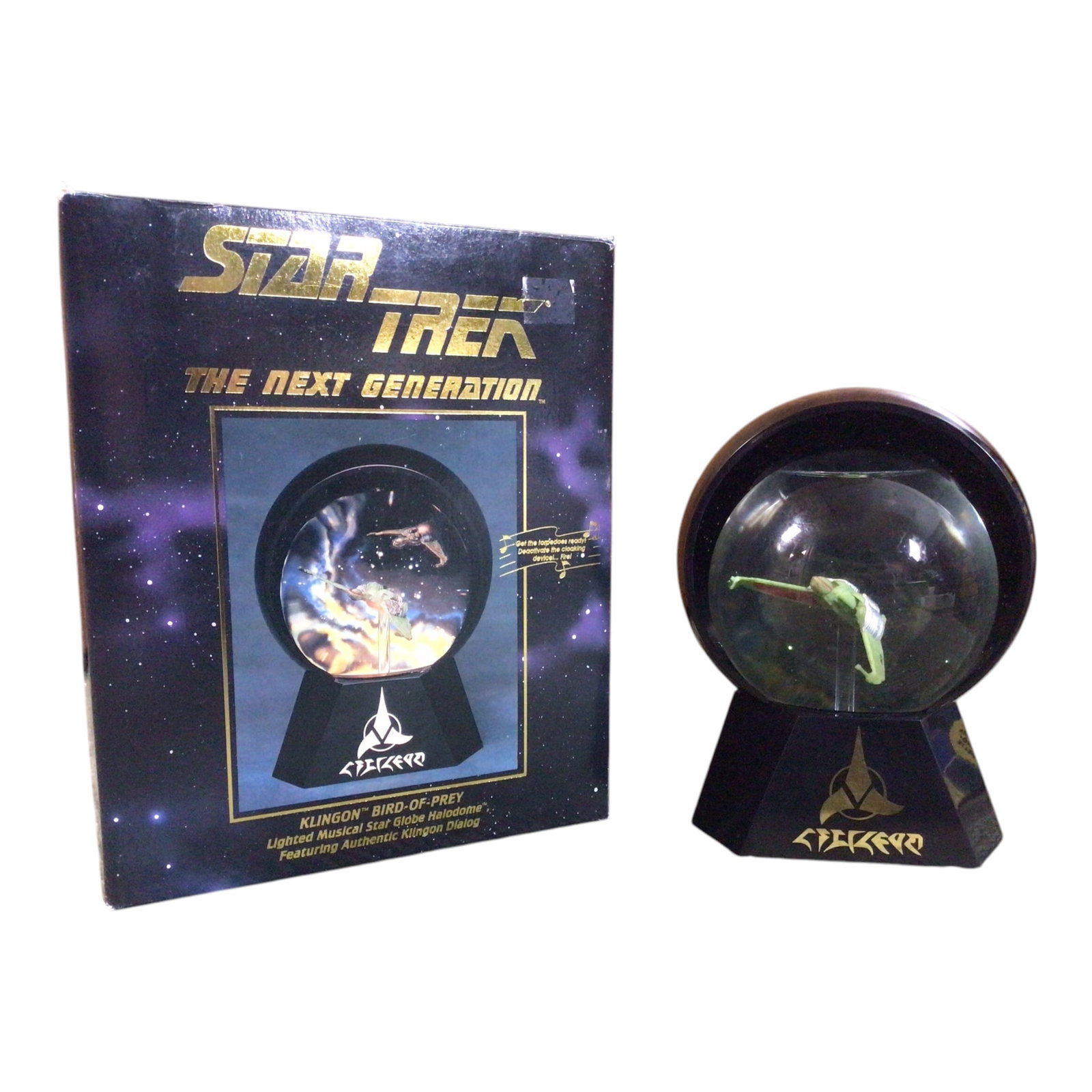 Star Trek: TNG Klingon Bird-of-Prey Musical Star Globe - With Box: A rare collectible from The Next Generation, this musical Star Globe features a detailed Klingon Bird-of-Prey, complete with internal lighting, sound effects, and authentic Klingon voice lines. Housed