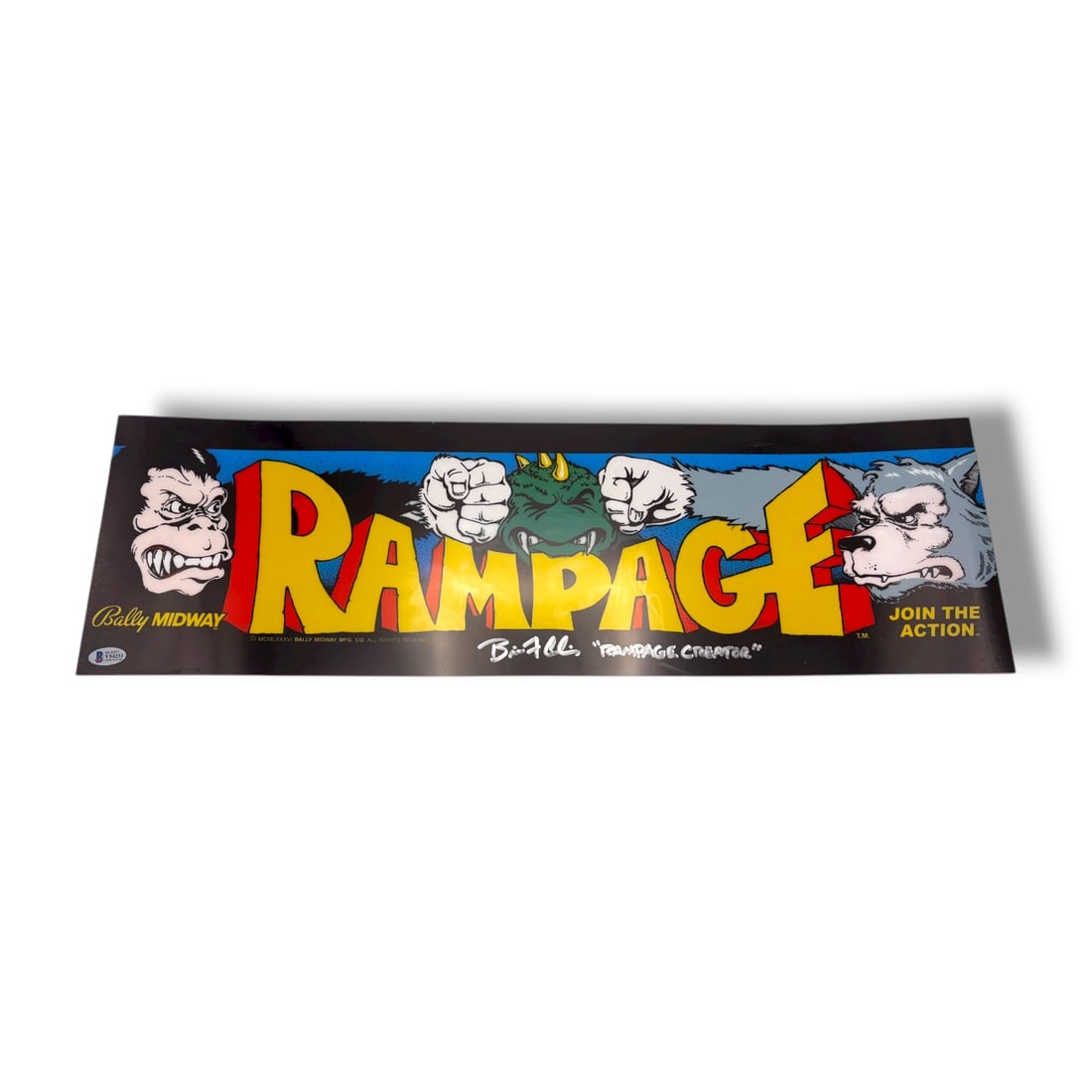 Rampage Arcade Marquee - (Signed by Brain Colin): Bring home a piece of true arcade history with this original Rampage arcade marquee, personally signed by game creator Brian Colin and authenticated by Beckett Authentication Services (BAS). Featuring