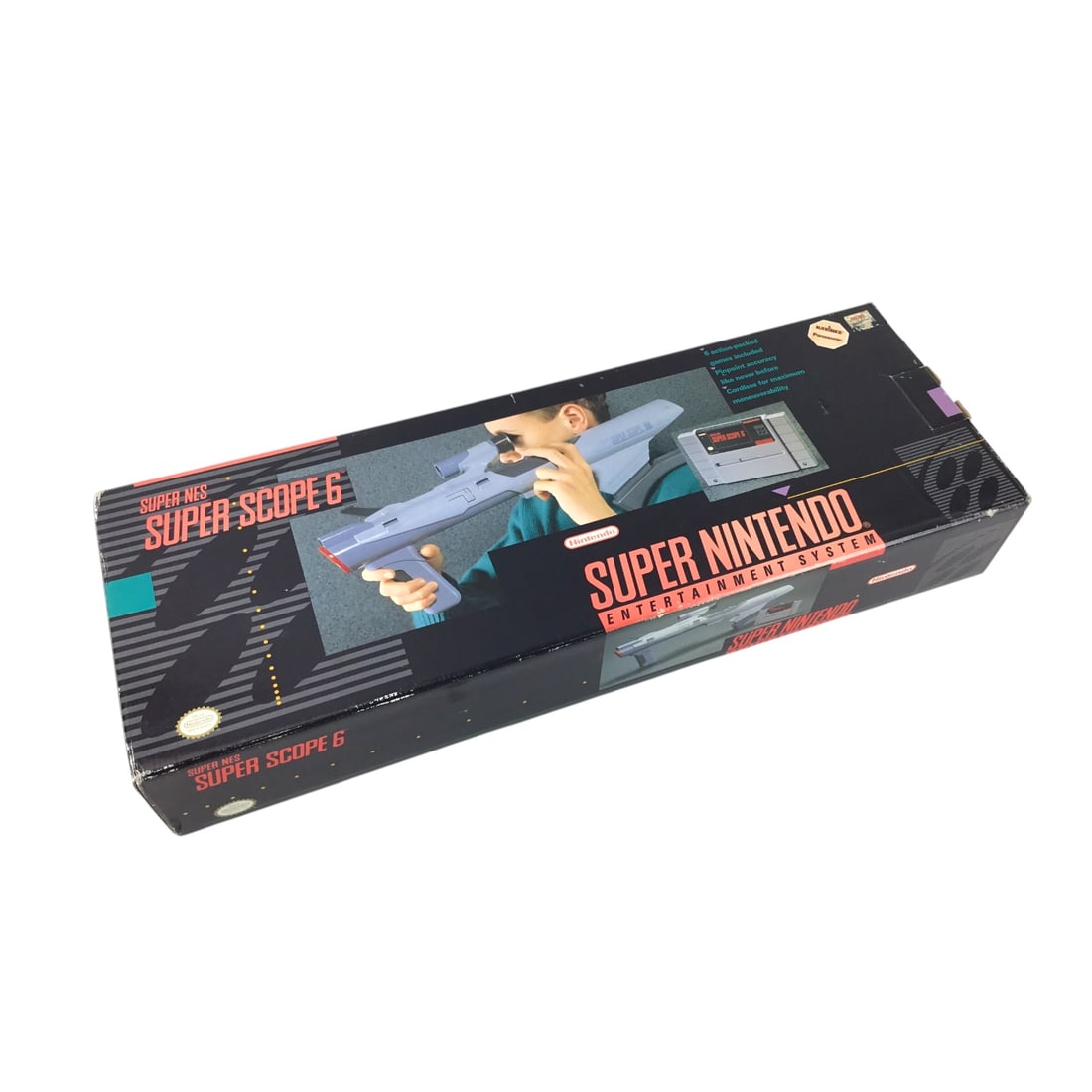 Nintendo SNES Super Scope 6, Complete in Box - Untested: This lot features the Nintendo Super Scope 6 for the Super Nintendo, complete in its original packaging. The set includes the Super Scope infrared light gun, receiver unit, sight attachment, Super Sco