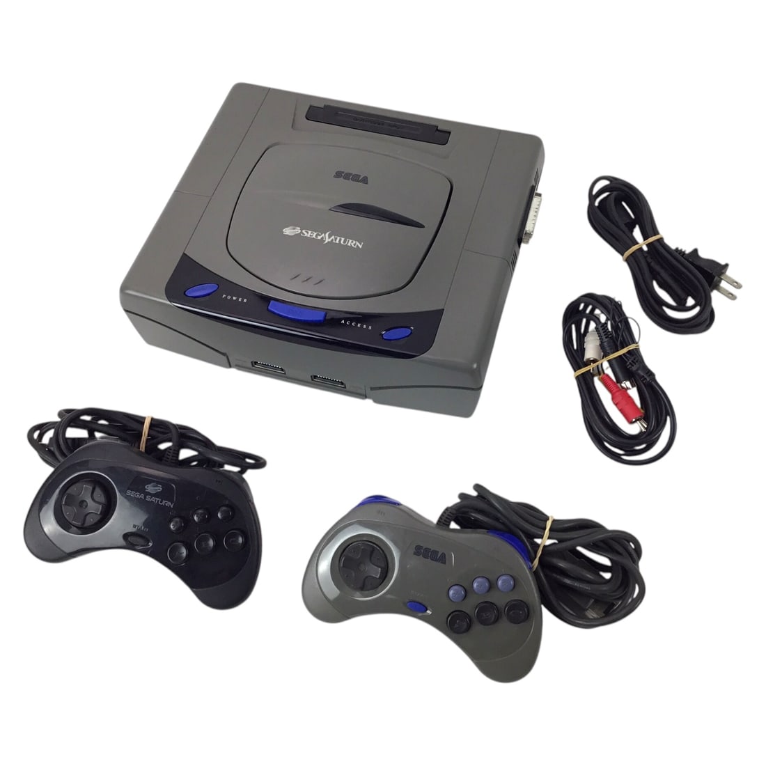 Sega Saturn Psy-Q Development Kit - Working Condition: Offered here is a rare Sega Saturn Psy-Q Development Kit, produced by Psygnosis for use in development studios during the Saturn era. The bundle includes the modified Saturn console, two controllers, 