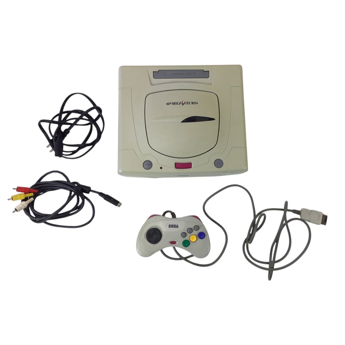 Sega Saturn Console - Japanese Version with Christmas Nights (Tested, Controller Nonfunctional): Here is a Japanese-region Sega Saturn console, tested and operational. The lot includes a power cable, AV cable, and one controller (nonfunctional). Also included is Christmas Nights into Dreams, a li