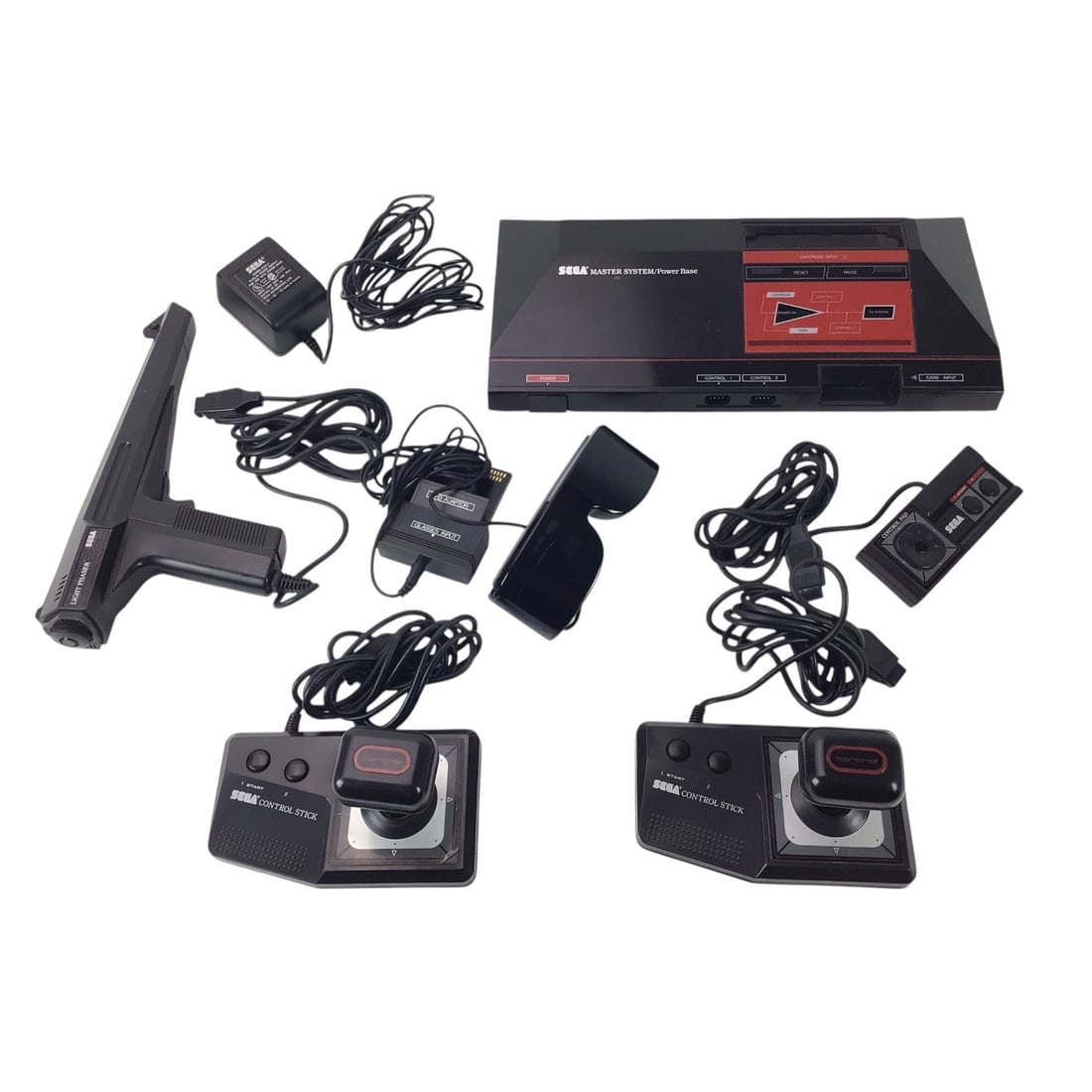 Sega Master System Console Lot with Light Phaser, 3D Glasses & Controllers: A complete Sega Master System bundle featuring the console, two standard controllers, the rare Control Stick, the Light Phaser gun, and the sought-after 3D Glasses model 3320. Console powers on (furth