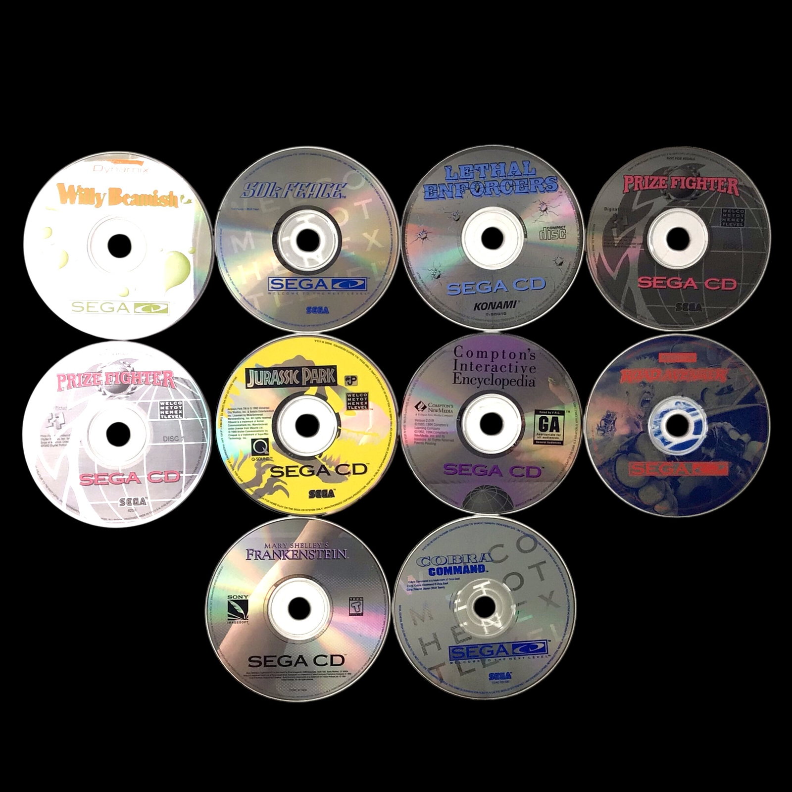 Sega CD Game and Disc Collection: Lot of Sega CD games including Willy Beamish, Sol-Feace, Lethal Enforcers, Prize Fighter (two copies), Jurassic Park, Compton's Interactive Encyclopedia, Road Avenger, Mary Shelley's Frankenstein, and