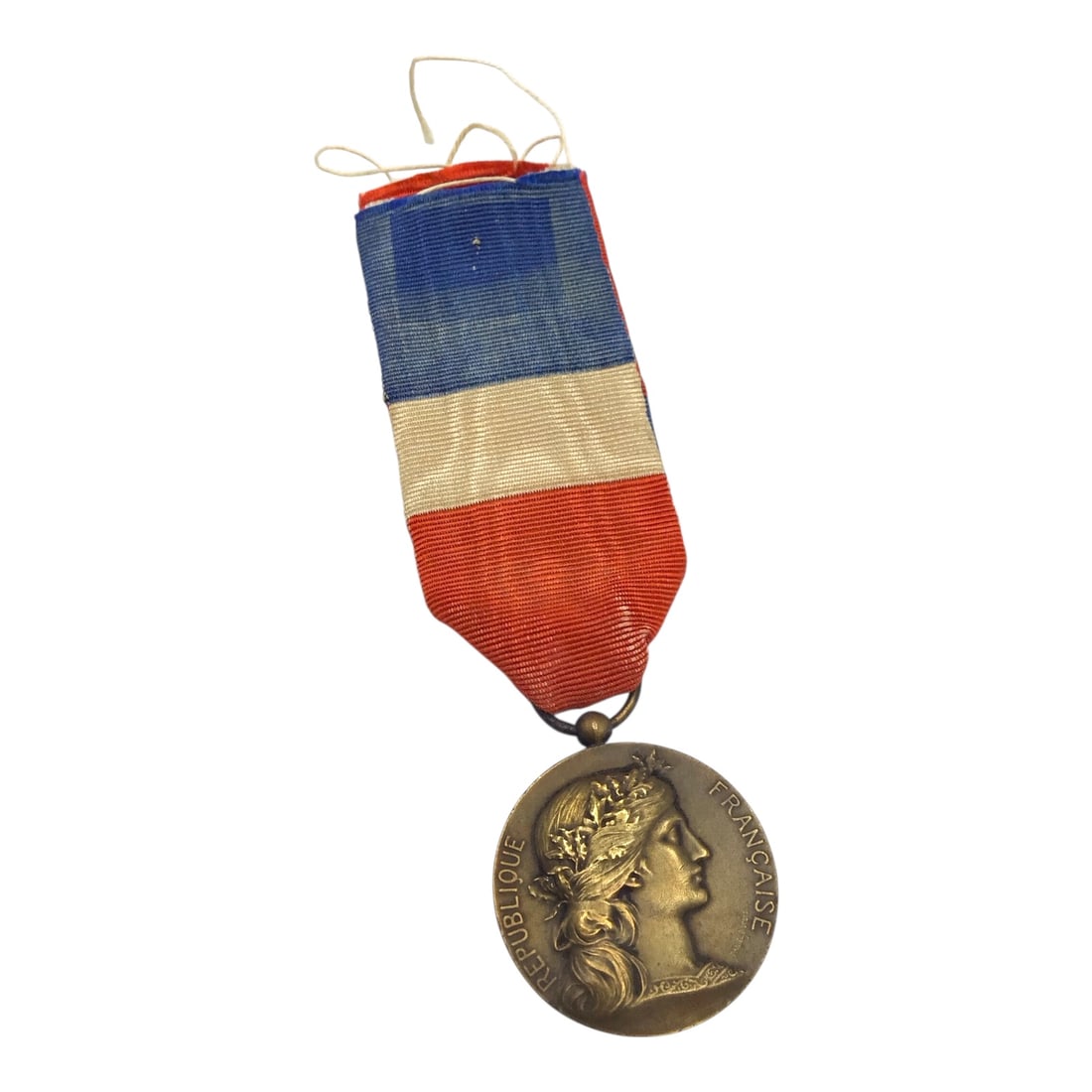 French Bronze Medal of Honor with Silk Ribbon - RARE as it is named to E. Viguier - Dated 1938: This rare and desirable French Bronze Medal of Honor is a named example awarded to E. Viguier and dated 1938. The medal is suspended from its original silk tricolor ribbon and presents in strong condi