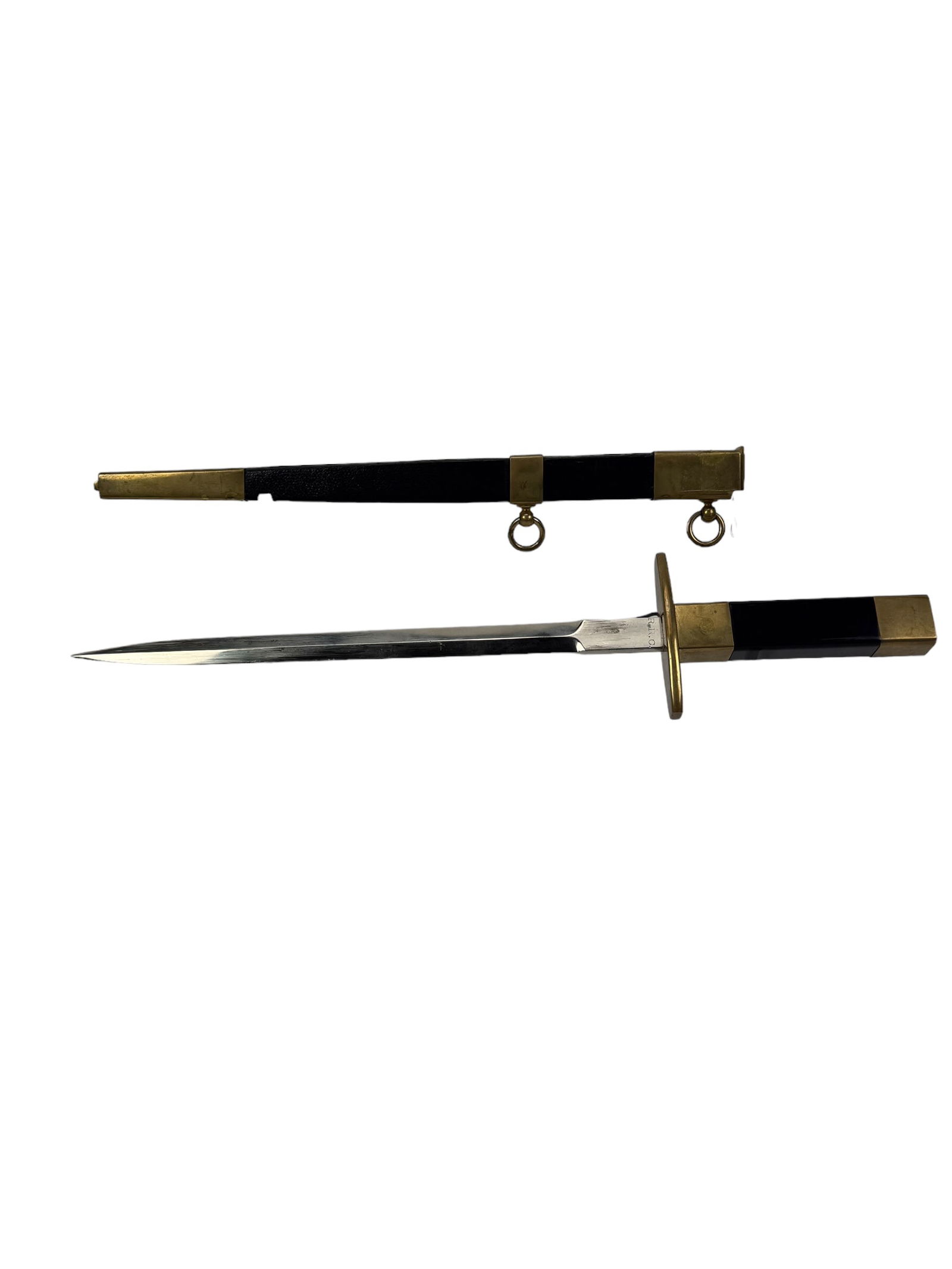 1934 French Air Force NCO Dagger - R.R.C Engraving: The 1934 French Air Force NCO Dagger is elegant weapon and rare find, featuring a blue grip and an engraved "R.R.C" marking on the blade. This dagger is similar to the officer's version displayed in t