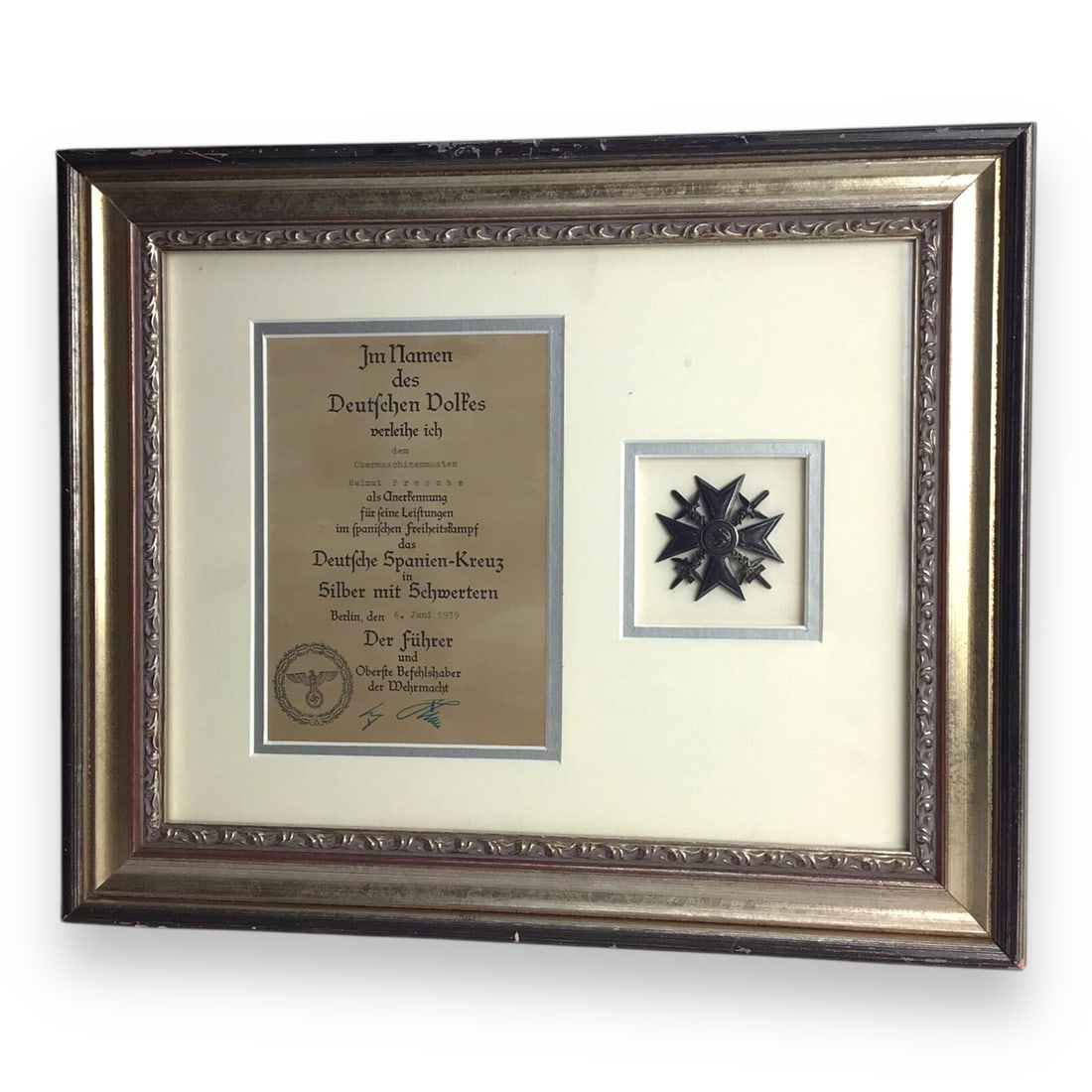 German 1939 Spanish Cross in Silver with Swords Badge & Award Certificate to Helmut Presche: An original WW2 German Spanish Cross in Silver with Swords, awarded to Helmut Presche, Head Machine Mate, for his service during the Spanish Civil War (1936-1939). This prestigious combat decorati